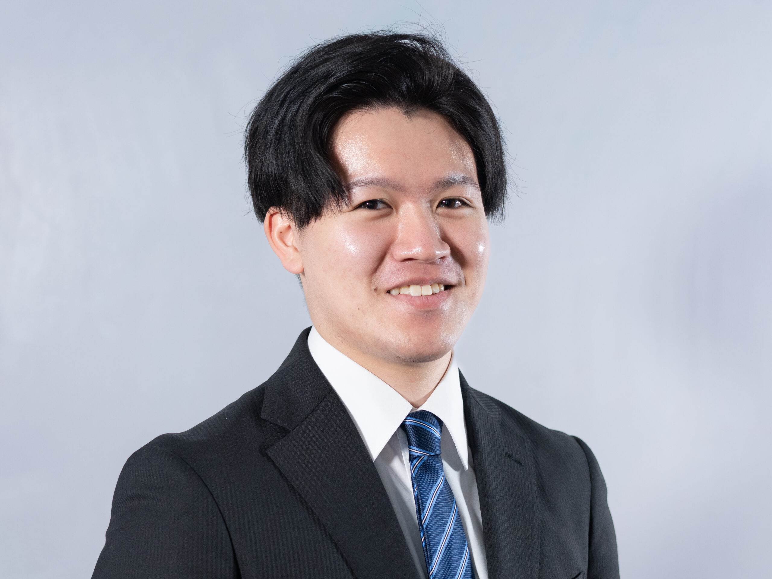 岳 直希